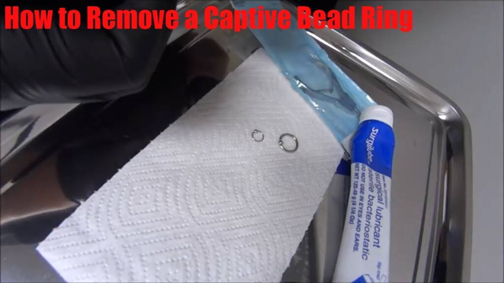 So entfernen Sie die Perle vom Captive Bead Ring – Körperpiercing-Schmuck